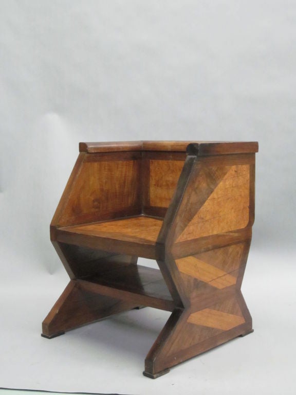 An Extraordinary Italian Futurist Pair of Lounge Chairs/ Club Chairs / Armchairs.  

The structure of these rare and stuning works expresses the Futurists fascination with speed and continual movement in its use of multiple planes and defracted