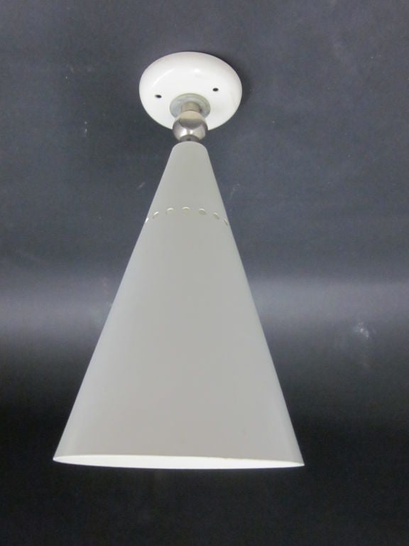 Four Italian Mid-Century Modern reflector wall lights / flush mount ceiling fixtures that will adjust position and rotate 360 degrees to focus light as desired.

Priced by the individual sconce but sold by the pair.