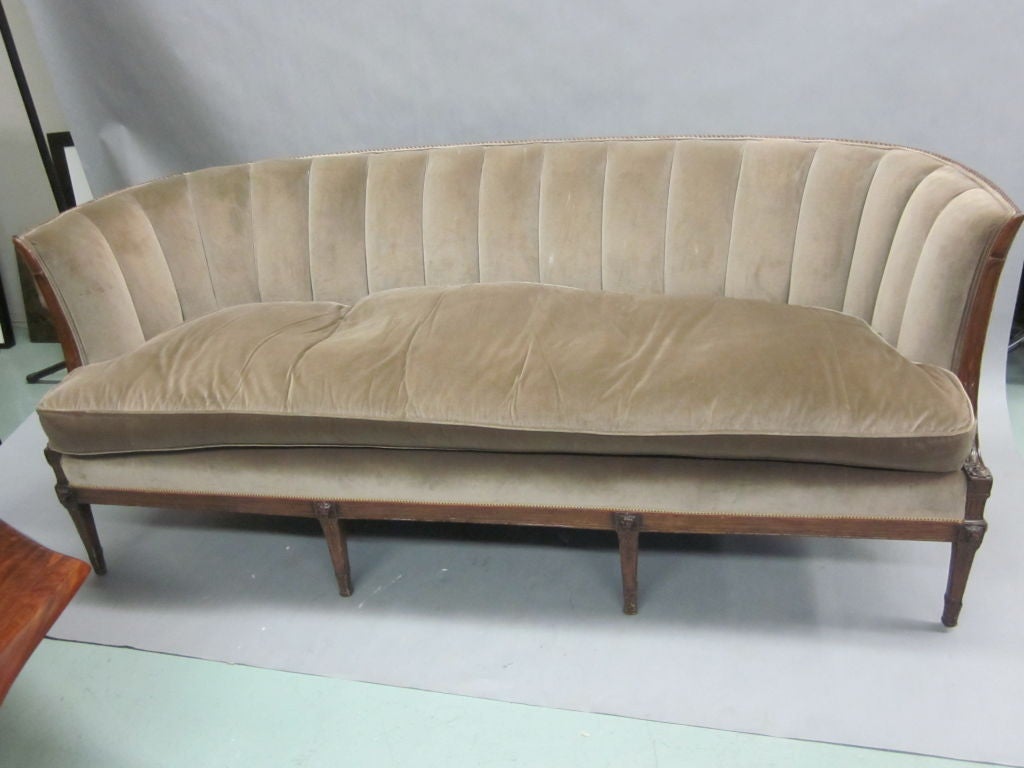 Timeless, Elegant French 1940's Sofa with an Exquisite Tapered Form and Delicate Carved Rope Detailing Tracing the Top Back Give this Piece the Highest Design Quality and Sculptural Presence for a Sofa of any Epoch.