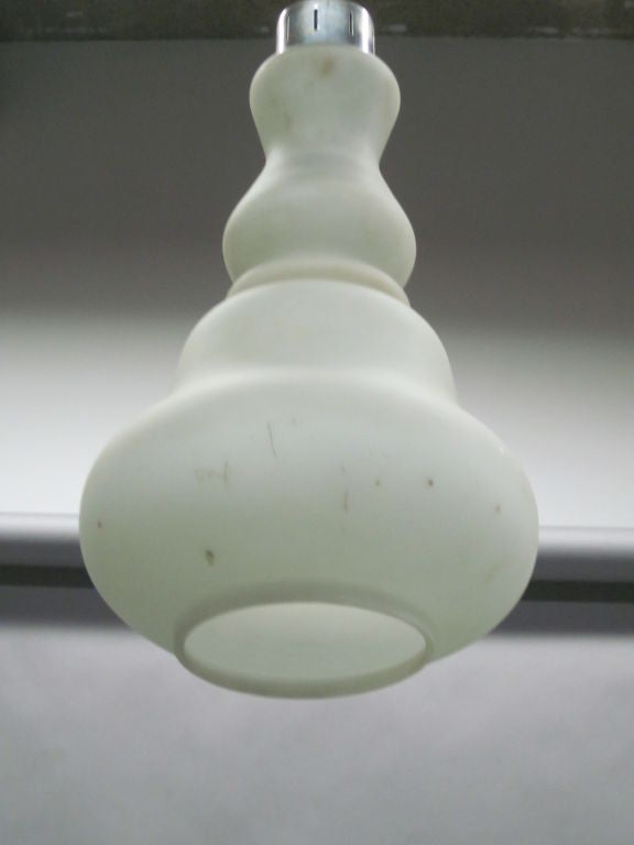 An Italian Milk Glass Fixture with a Simple, but Tantalizing Form!<br />
<br />
Made for 1 edison socket. Can be flush mounted or used as a pendant.