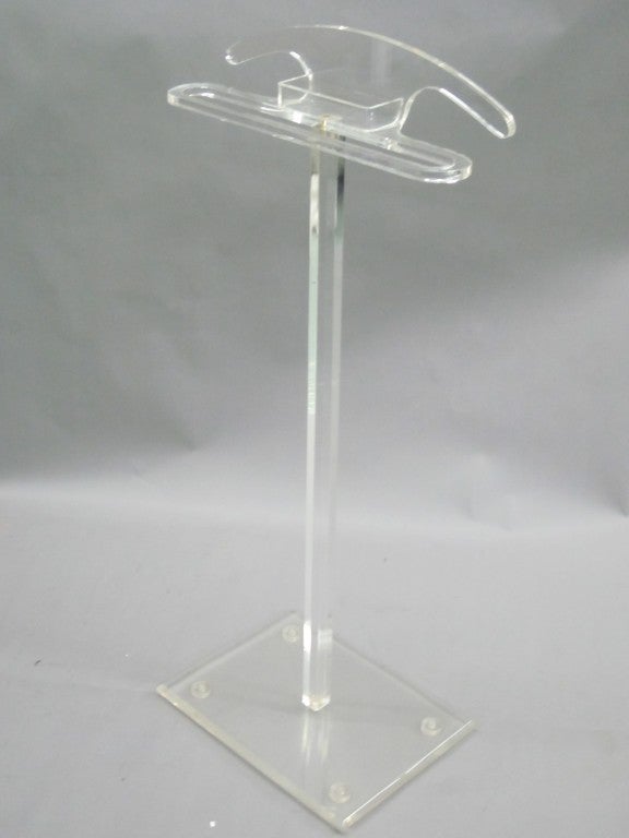 2 French Mid-Century Modern Perspex / Plexiglass valets with coat stands and pants rack. One piece has a jewelry box and one does not.

Priced and sold individually.
