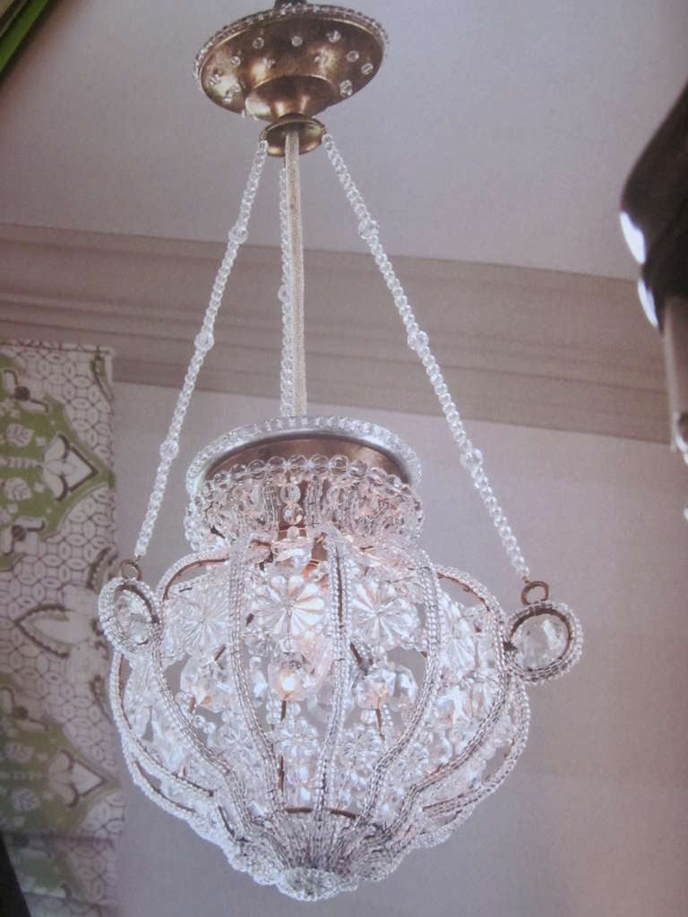 Pair of stunning, delicate Florentine crystal pendants / chandeliers / lanterns with crystal beads and rosettes. Set up for one edison socket.

Priced and sold individually.