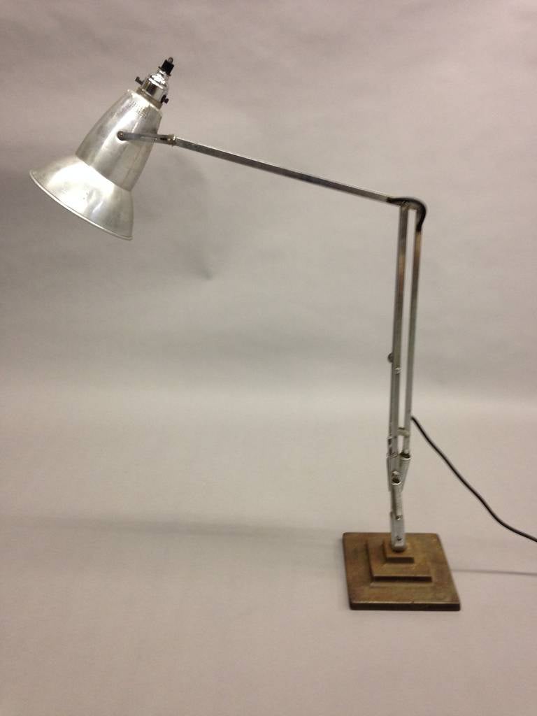 The Original Iconic Modern Industrial Table Lamp, Model 1227, Known as 'Anglepoise' for its Ability to Adjust as Needed. Designed by George Cawardine for Herbert Terry and Sons. This is the original model with a 3-level steel base.

Literature: A