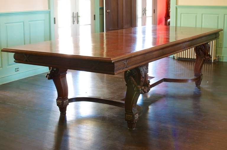 Large French Belle Epoque Carved Dining Table in Mahogany. There is 1 additional 12
