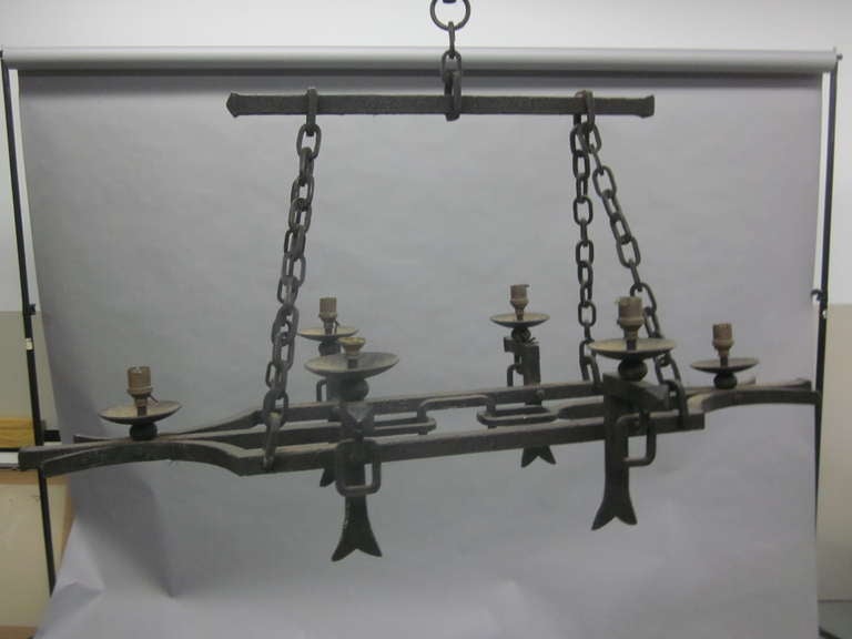 Rustic French 1940 Hand-Hammered Wrought Iron Chandelier in Style of Gilbert Poillerat For Sale