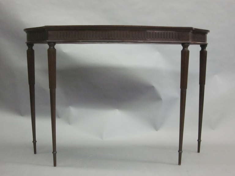 Elegant Italian Carved Wood Console by Paolo Buffa with Dramatic Tapered and Fluted Legs. Stone top is not shown. 

Documentation: Affixed with factory sticker to bottom: 