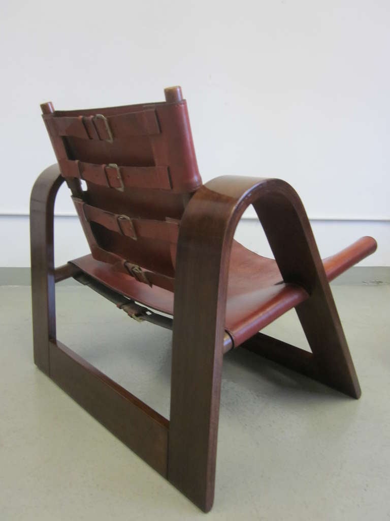 mid century leather strap chair