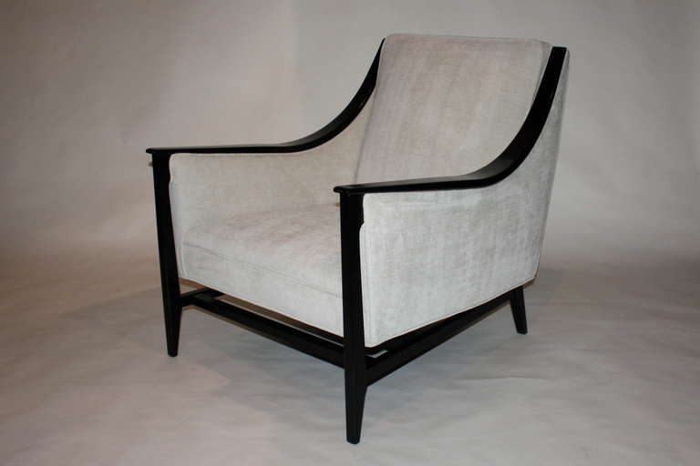 Beautifully crafted pair of chairs in mahogany and velvet. Sculptural with excelent construction.