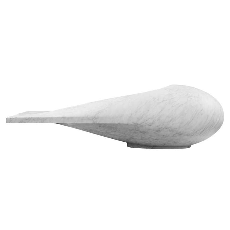 A chaise longue of solid white carrara marble designed by Guillaume Bardet (b. 1971). From the edition of 8.