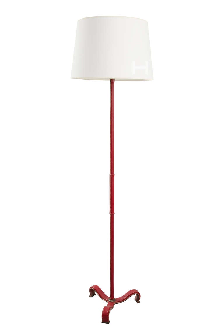 Red leather floor lamp by Jacques Adnet (1901-1984), custom paper shade.