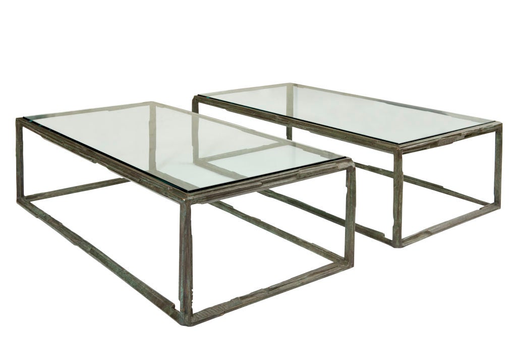 A pair of unique rectangular, patinated bronze cocktail tables. Signed. By Bruno Romeda (b. 1933).
