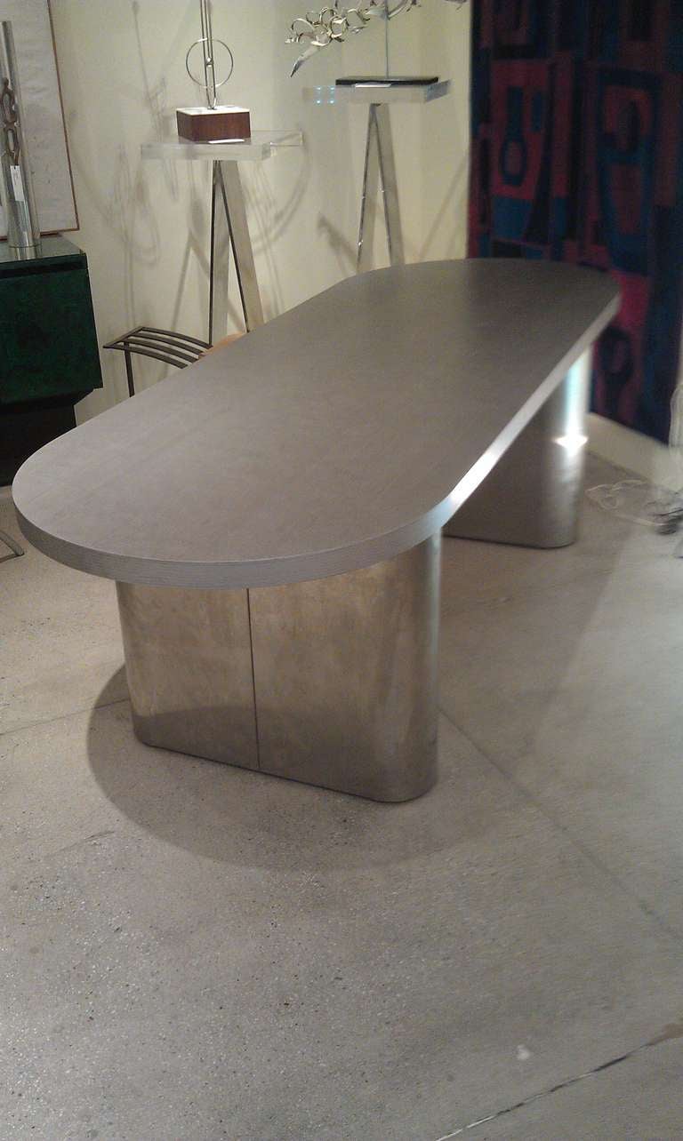 Wood top dining table with steel base and aluminum faux finish circa 1960.