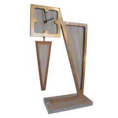 brass and aluminum pendulum clock