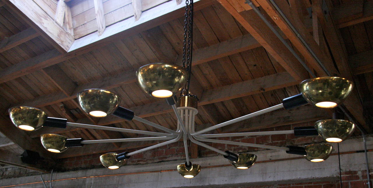 Italian ceiling light, circa 1950.
Metal tube, painted white, brass and aluminum sheet.
One sexy ceiling fixtures!