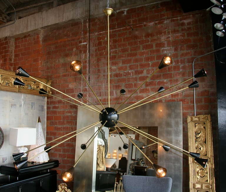 Does this light have an ego! Gorgeous enormous large brass and black lacquered 1970s Sputnik!