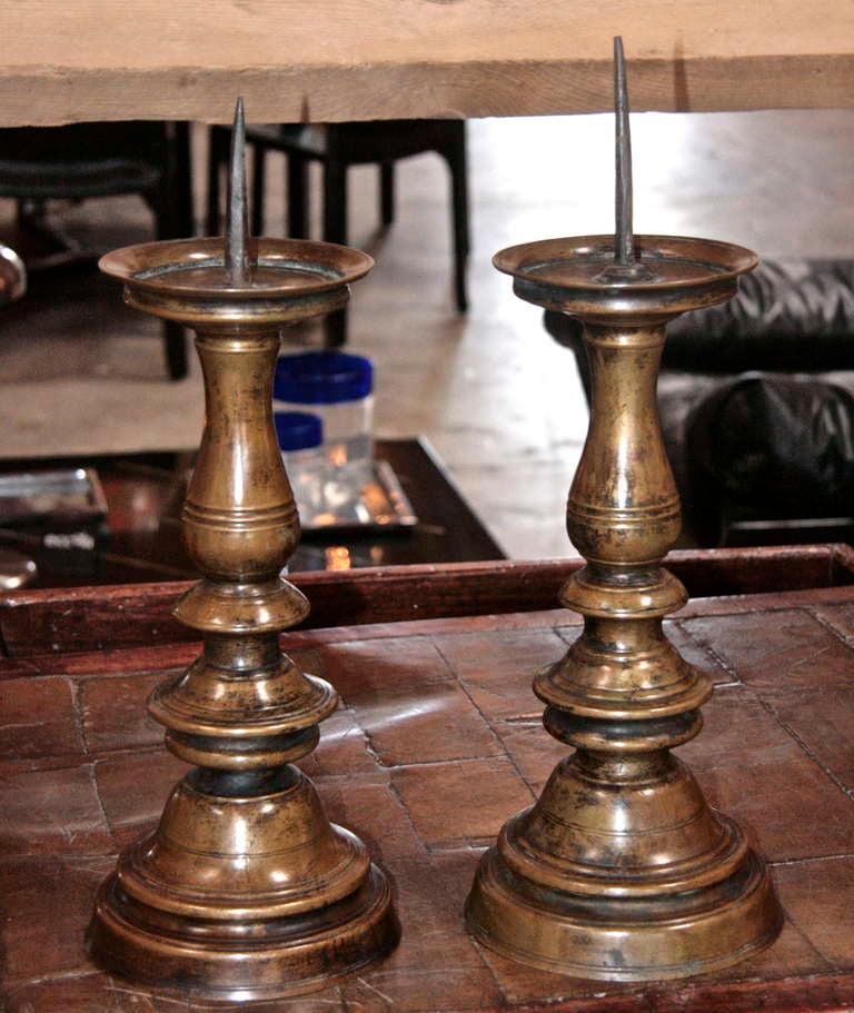 Solid heavy Italian bronze 18th century candlesticks, straight from the Vatican to you with amore.