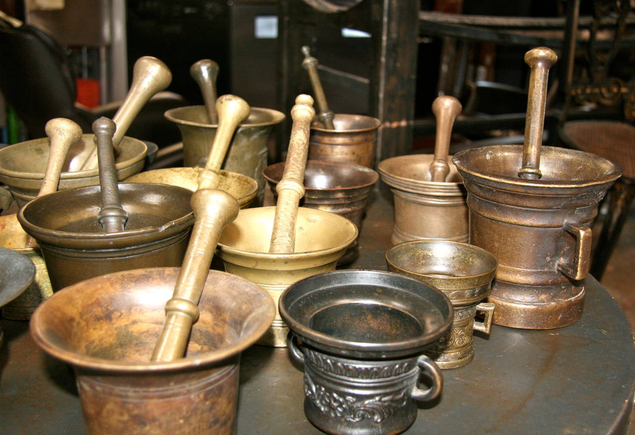 Mid-20th Century Collection of 17 Pharmacy Mortar and Pestles For Sale
