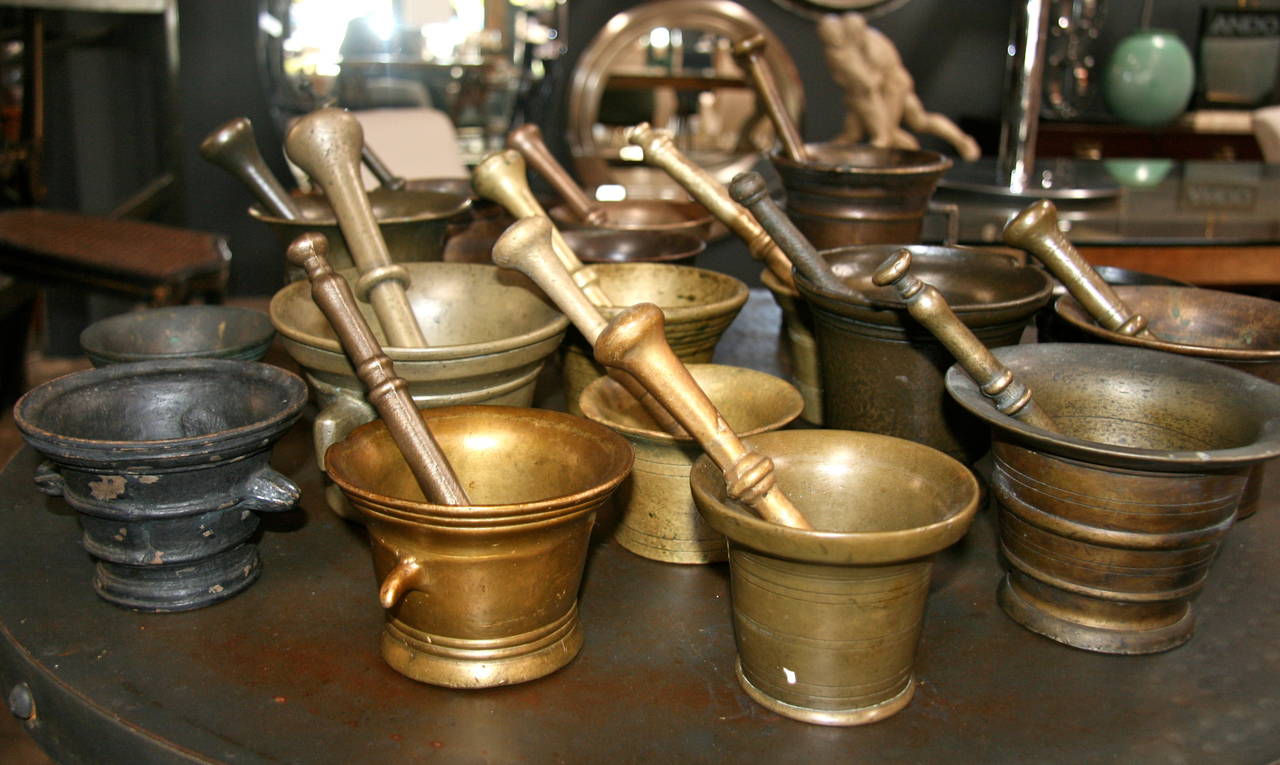 Mid-20th Century Collection of 17 Pharmacy Mortar and Pestles For Sale