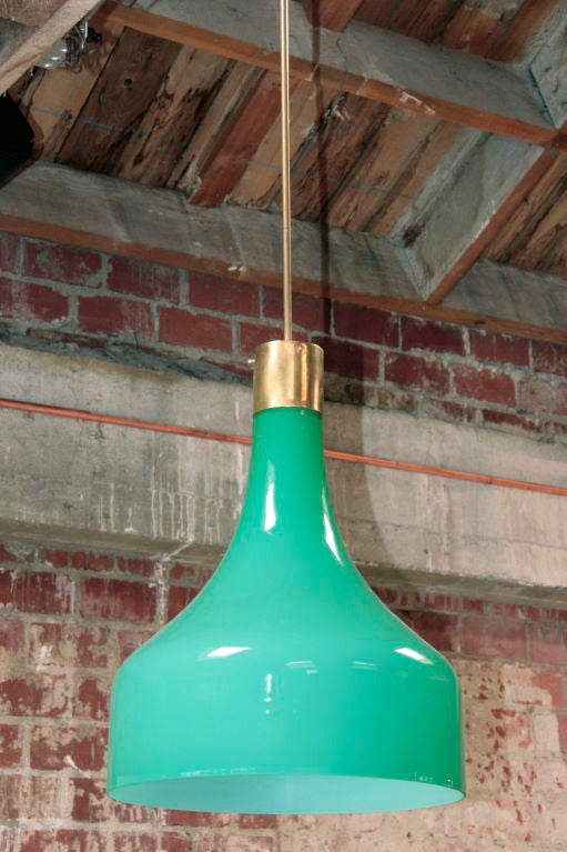 No it's not your eyes; it really is a large'ish gorgeous green murano glass pendant! WE LOVE IT!!