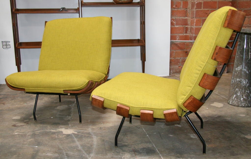 Manufactured by FORMA and published in DOMUS: N. 331, June 1957, pp.8-11; this teak w/black lacquered metal frame and brass finish is certainly a one of a kind find. We love our new acid green MAD MEN pillows too...