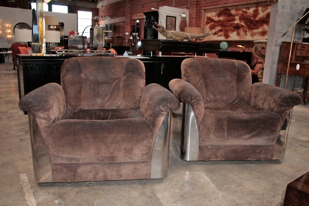 Bellissime Italian armchairs! Leather & steel; what more could you ask for.