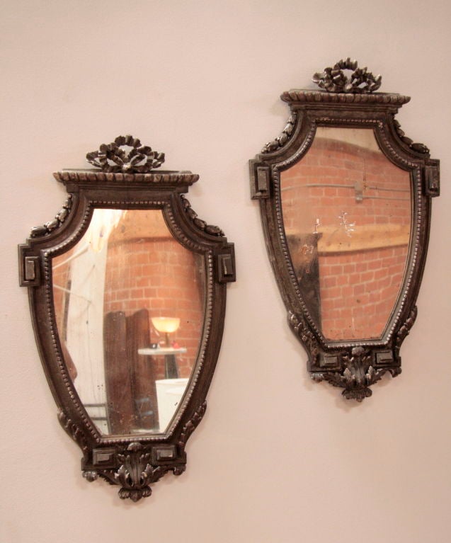 Elegantly carved, this bellisima pair of mirrors will do the job!
‘May be sold separately’.