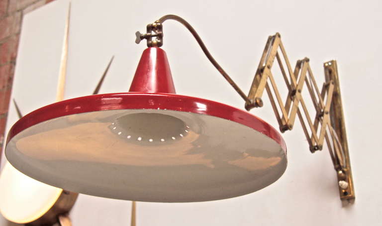 Lovely red extendable arm brass wall light for a pop of RED!!!