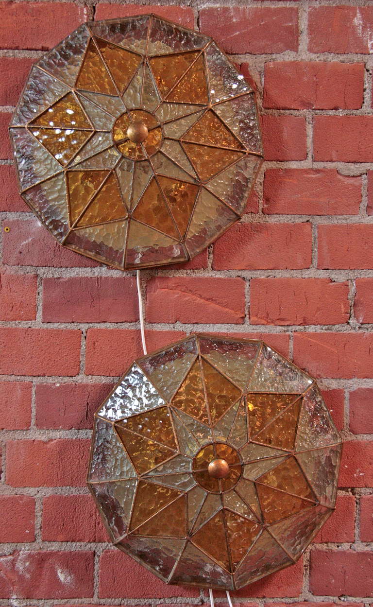Ceiling or wall, these star shape designed Tiffany style glass amber sconces will light up any space and then some.