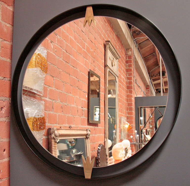 Chic design with a nod to the past,  this moderne mirror mimics good taste.