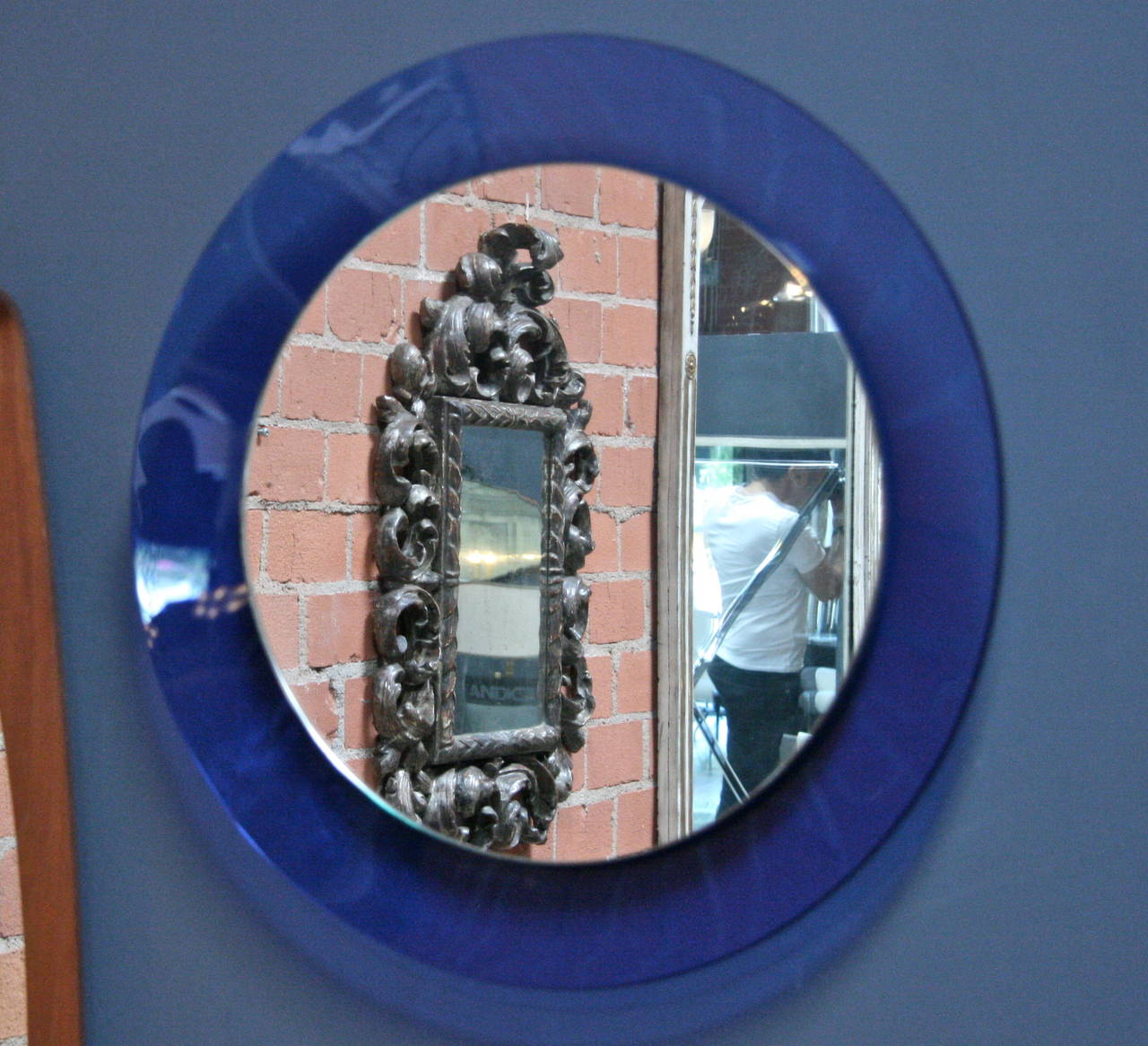 What do blue glass; Murano and mirror all have in common style.