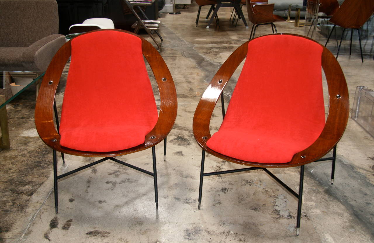 Ico Parisi lounge chairs Cassina Italy, 1955, Italian walnut, upholstery, steel, brass.
This pair was awarded the 