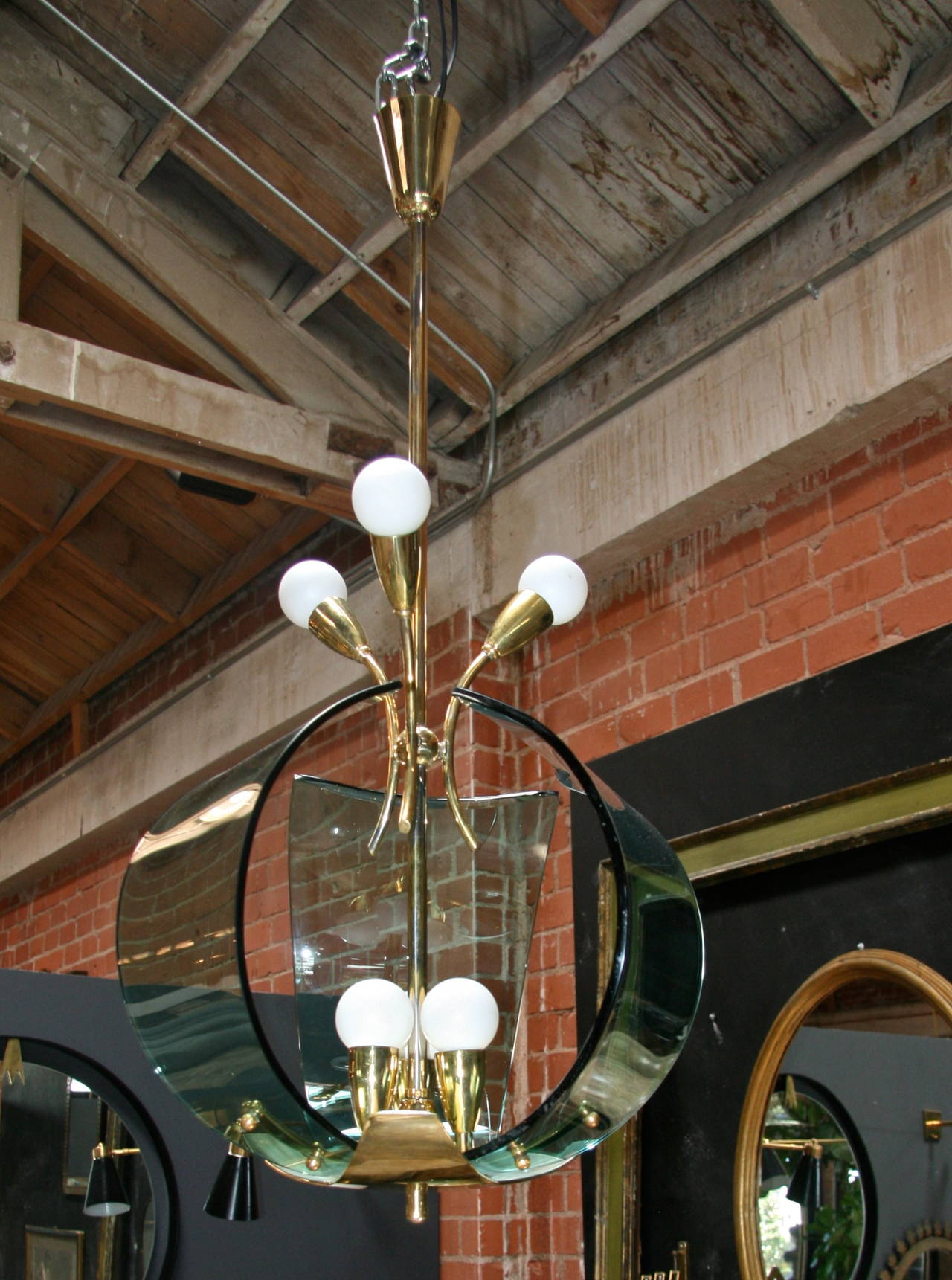 1950s fantastic fixture! What's not to like brass, handblown green Murano glass and brass.