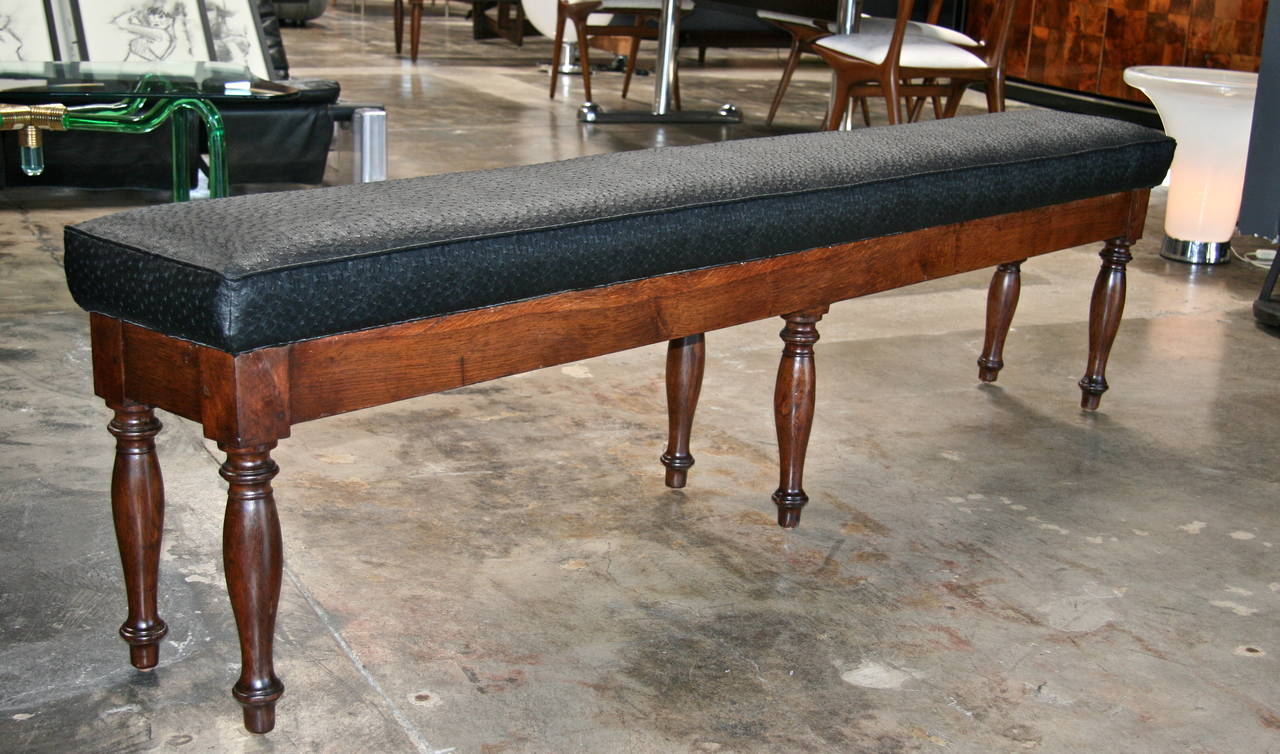 Italian 19th century walnut bench refinished just right and reupholstered in faux ostrich for your seating pleasure.