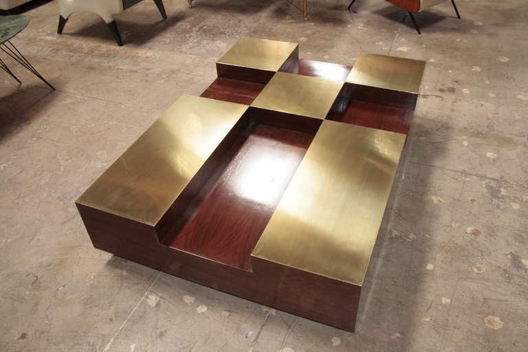 Italian coffee table
Pockets of burl wood and brass make this a true piece of art for your home.
