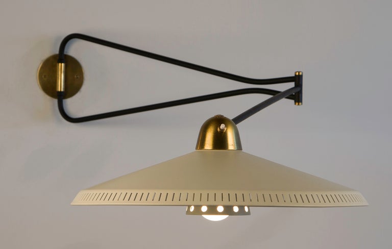 Extra large articulated wall lamp with rare double shade.