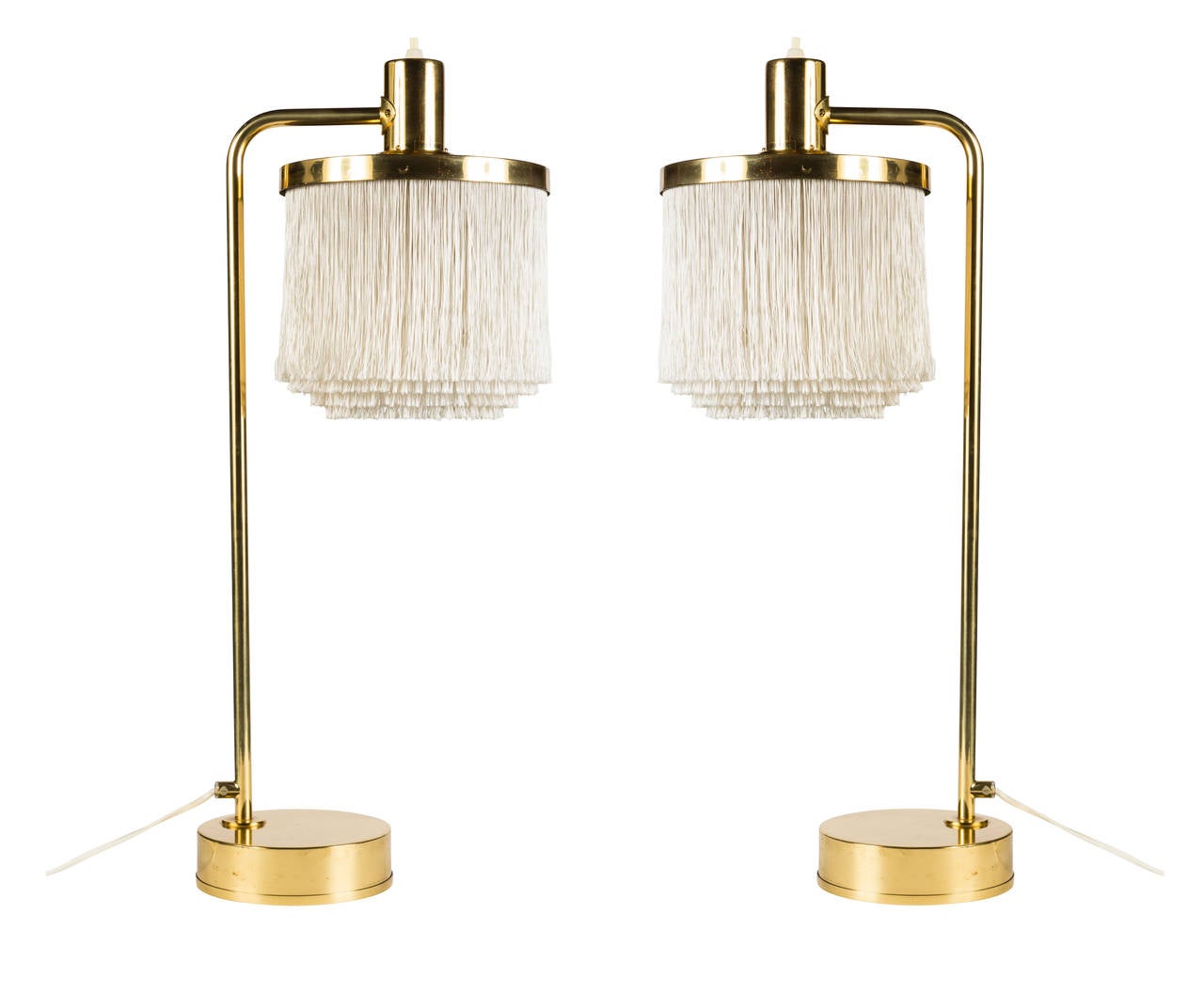 A pair of Markaryd brass and silk cord table lamps.