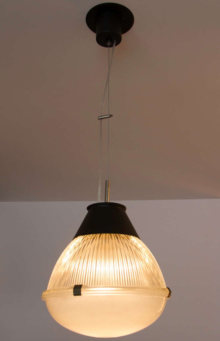 Glass and painted metal pendant in the style of Ignazio Gardella for Oluce designed in Italy, circa 1962. Wired for US junction boxes. Takes one E27 100W maximum bulb.