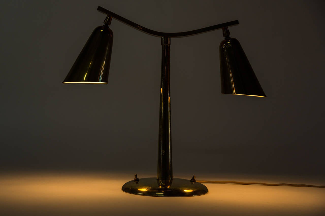 Solid brass double shade table lamp.