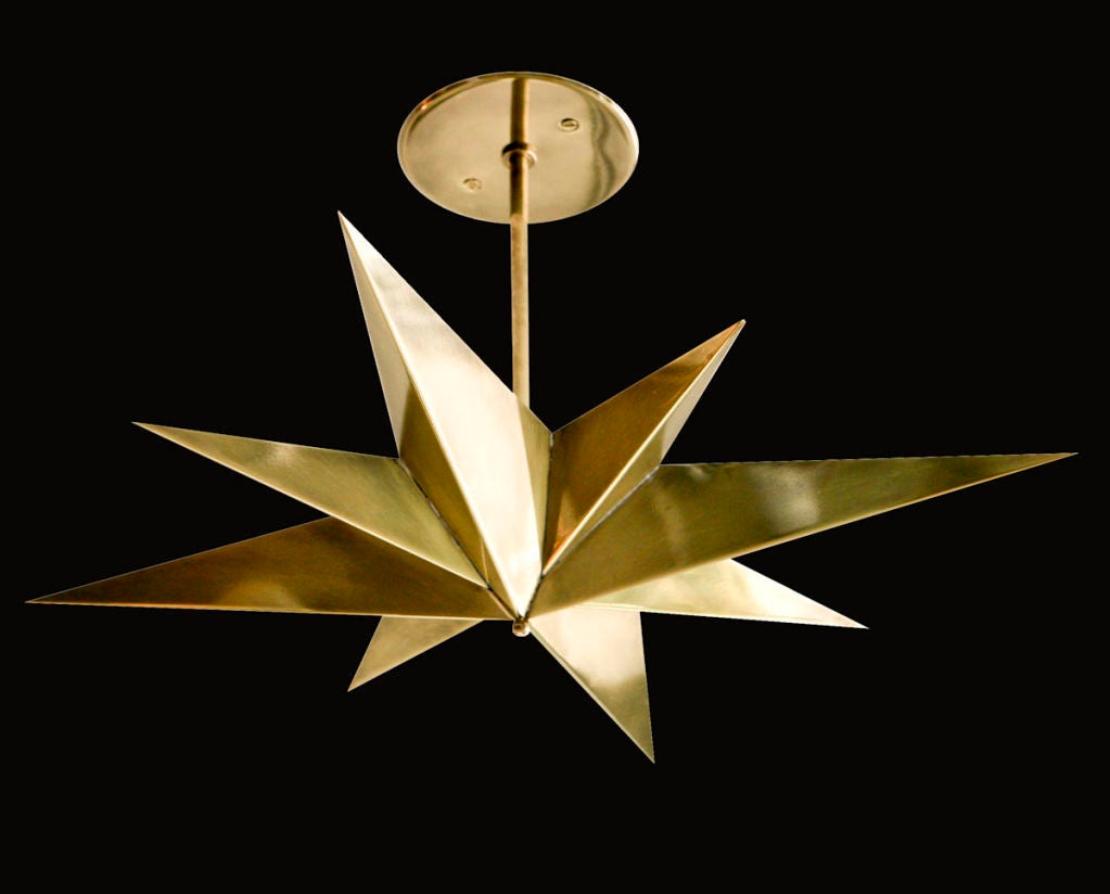 Rewire Custom Star Ceiling Light.  Fabricated by rewire gallery in Los Angeles. Brass, wired for US junction boxes. Takes four E26 40w maximum bulbs. Comes in un-lacquered brass. Overall drop can be customized.