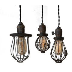 Three Industrial Cage Lamps