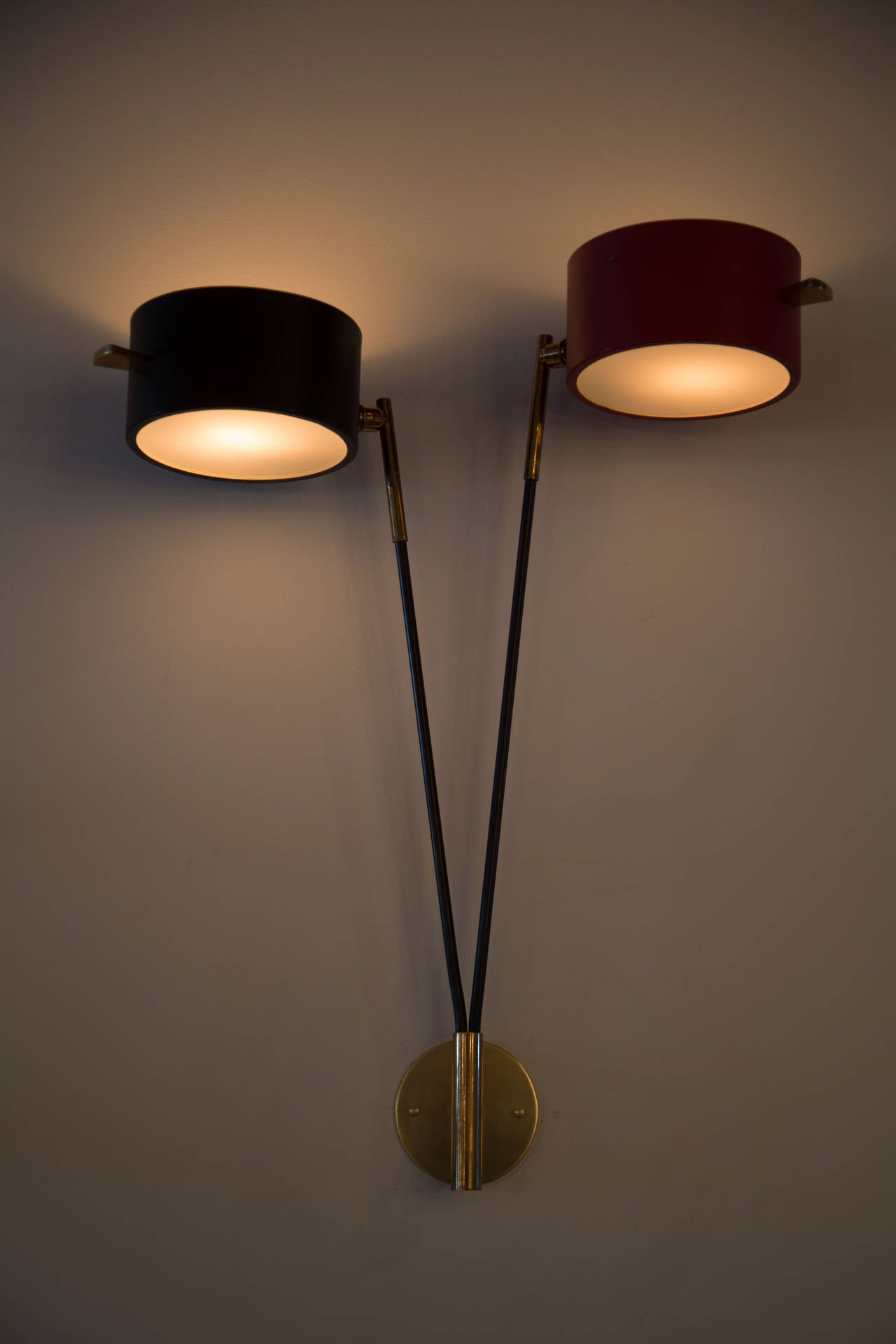 Double shade articulating sconce.