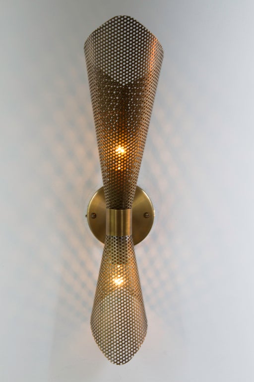 Rewire Custom Brass Perforated Sconce. Various finishes available upon request. Requires one E26 100w maximum bulb. Priced and sold individually.