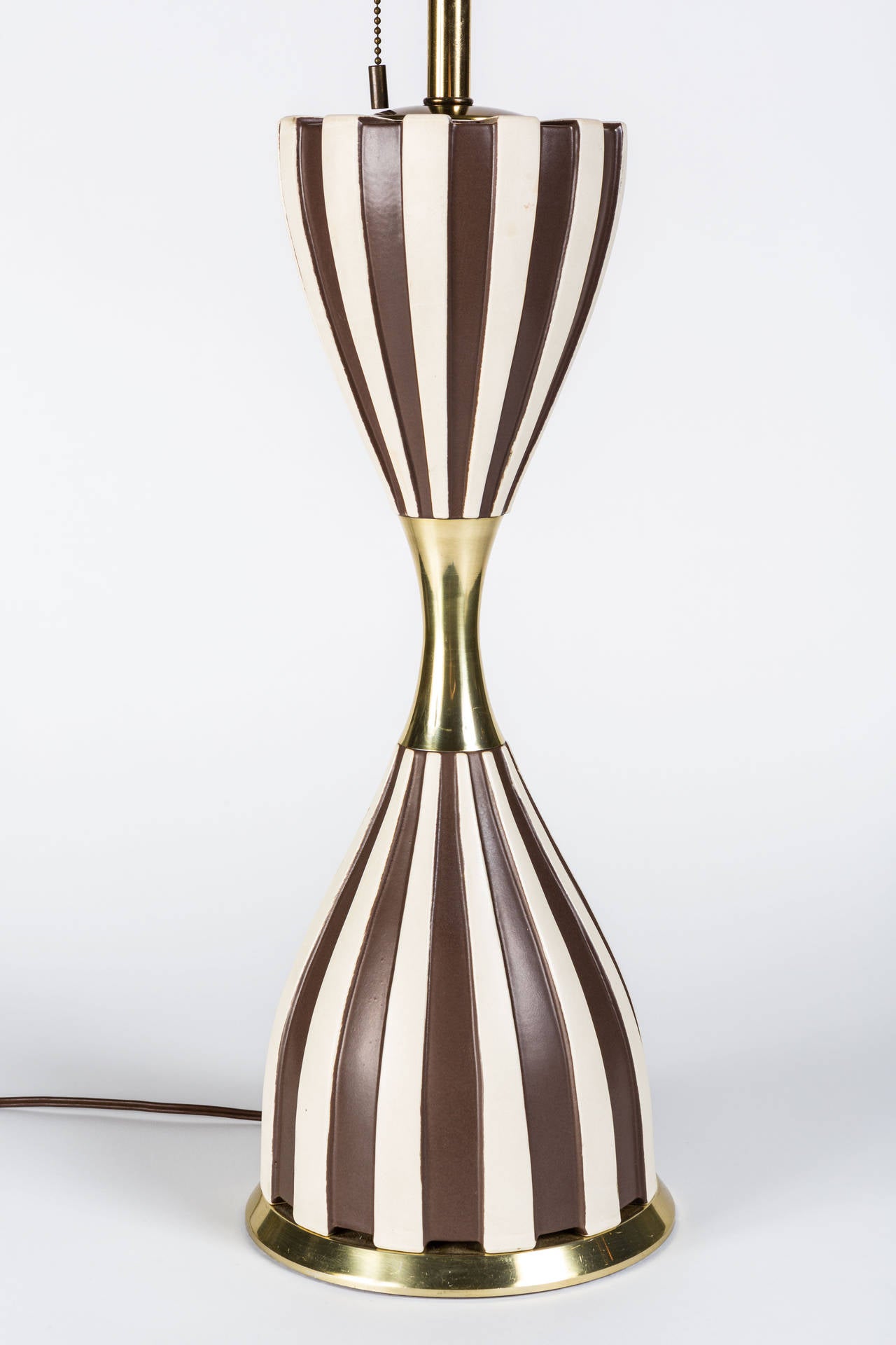 Brass and porcelain table lamps designed for Lightolier.