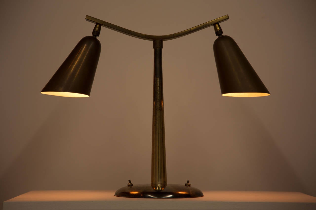 Solid brass double shade table lamp.