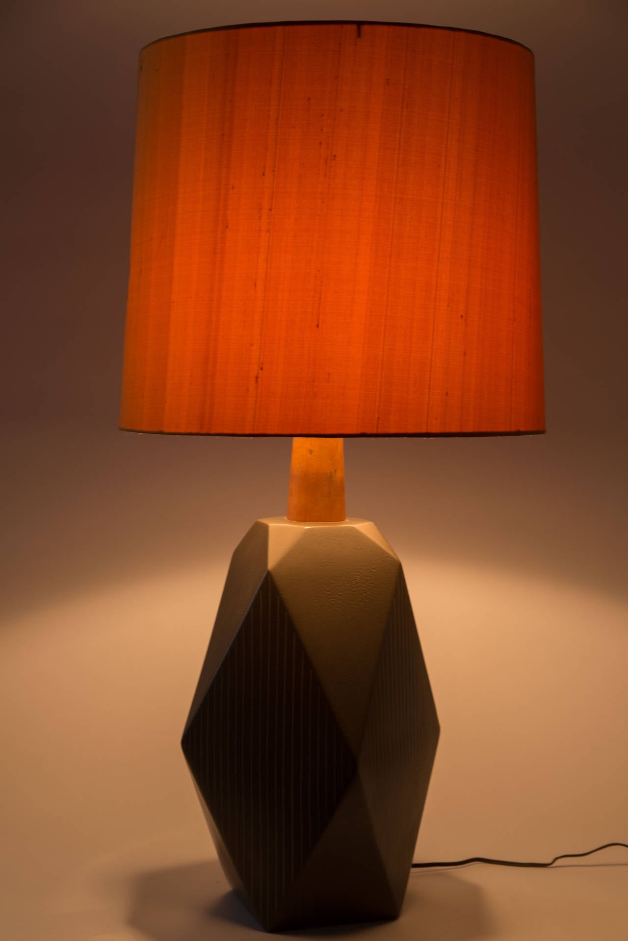 Rare geometric ceramic table lamp with original silk shade.