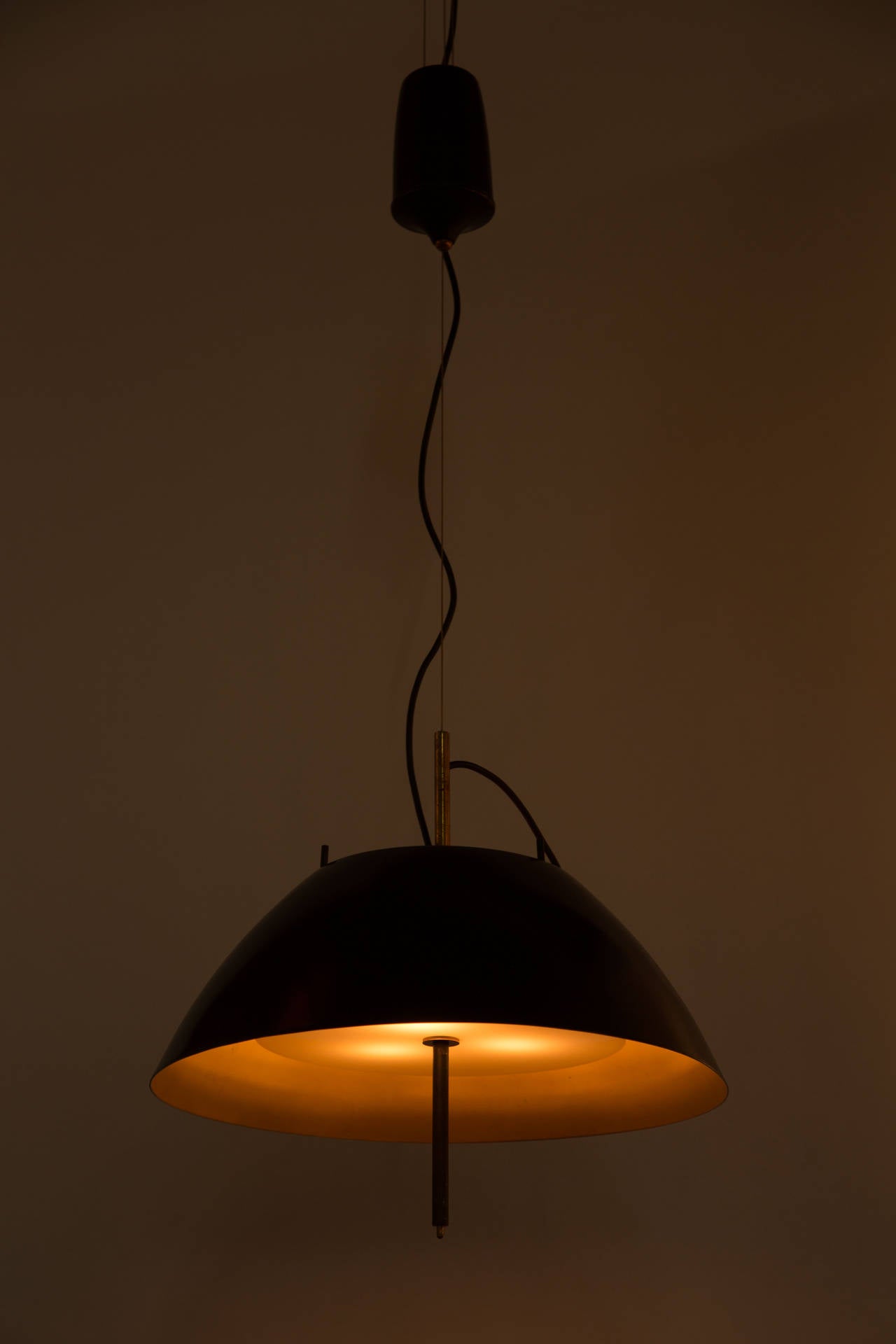 Rare Pendant by Oscar Torlasco for Lumi. Designed and manufactured in Italy, circa the 1950s.Counterweight pendant with unique on/off switch at bottom of the lever. Rewired for the US. Holds six US E12 adapter sockets. 