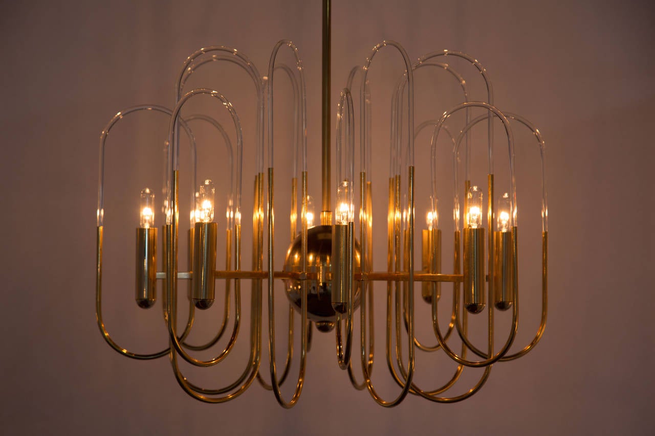 Brass and glass filament chandelier.