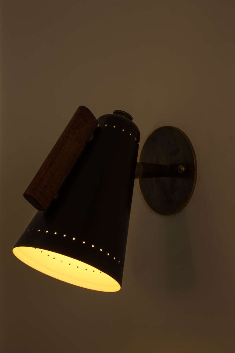 Wood and Enameled Shade Pivot Sconces
Perforation at Rim and Top of Shade