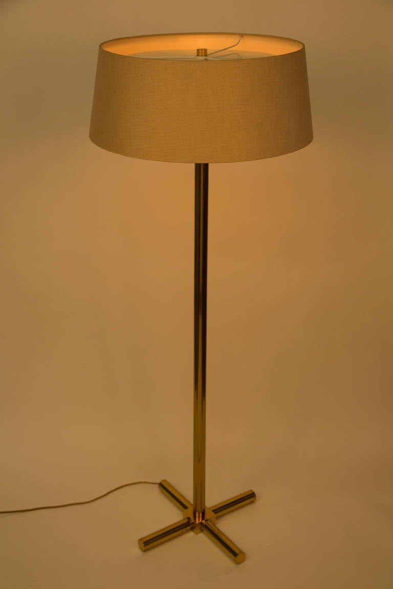 Polished brass floor lamp with original shade.