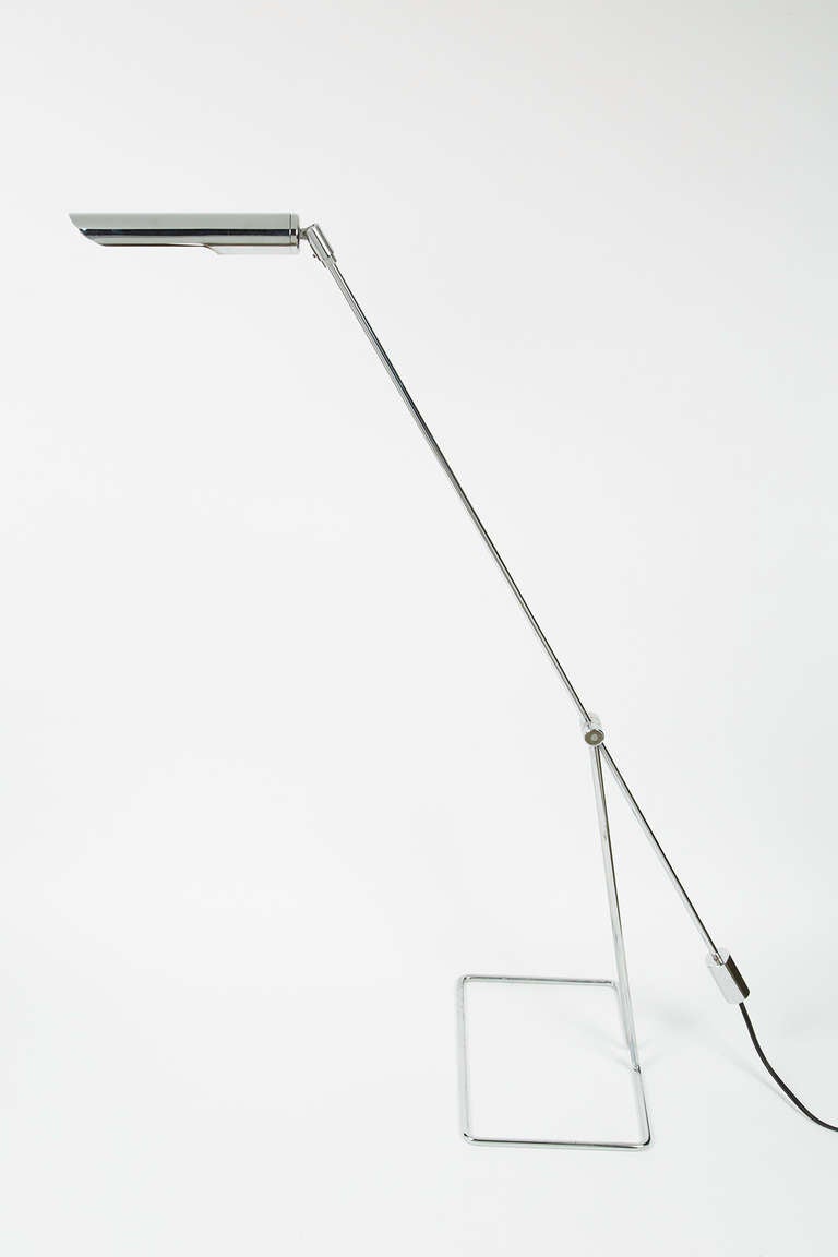Abo Randers adjustable floor lamp.  Lamp pivots both at the center hinge and at the shade.